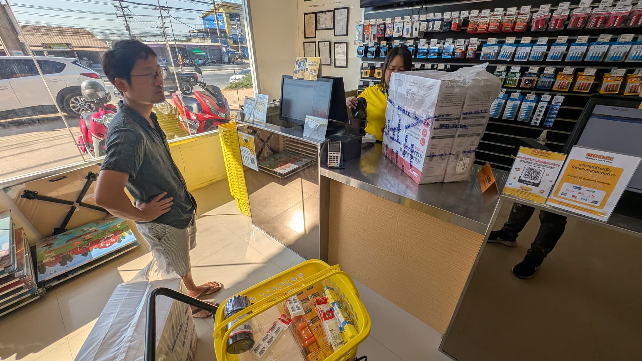 Paying at Mr. DIY — fans, first aid kit, and school supplies for Samson House. — January 2026 · 80 children fed