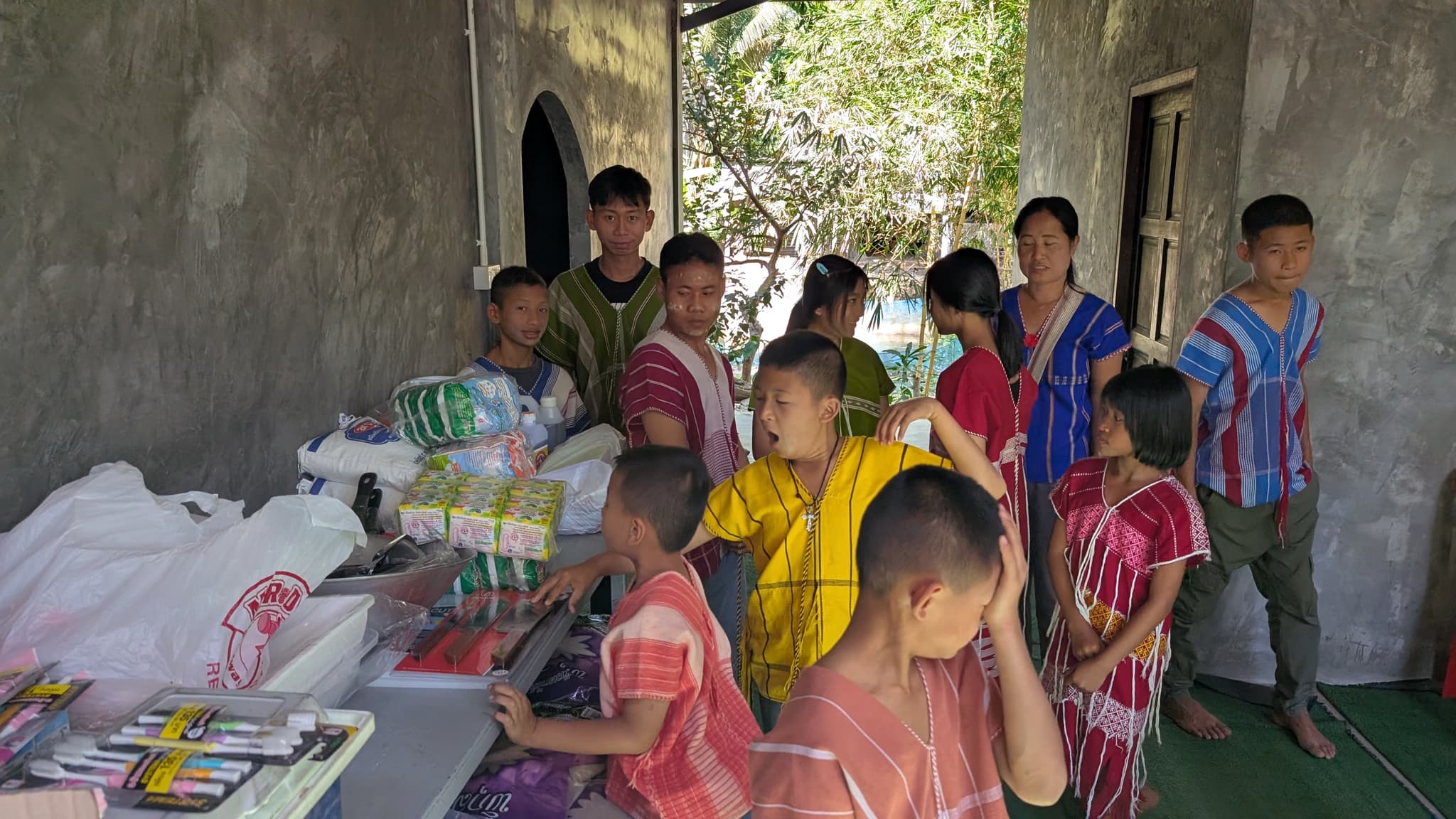 Children receiving school supplies